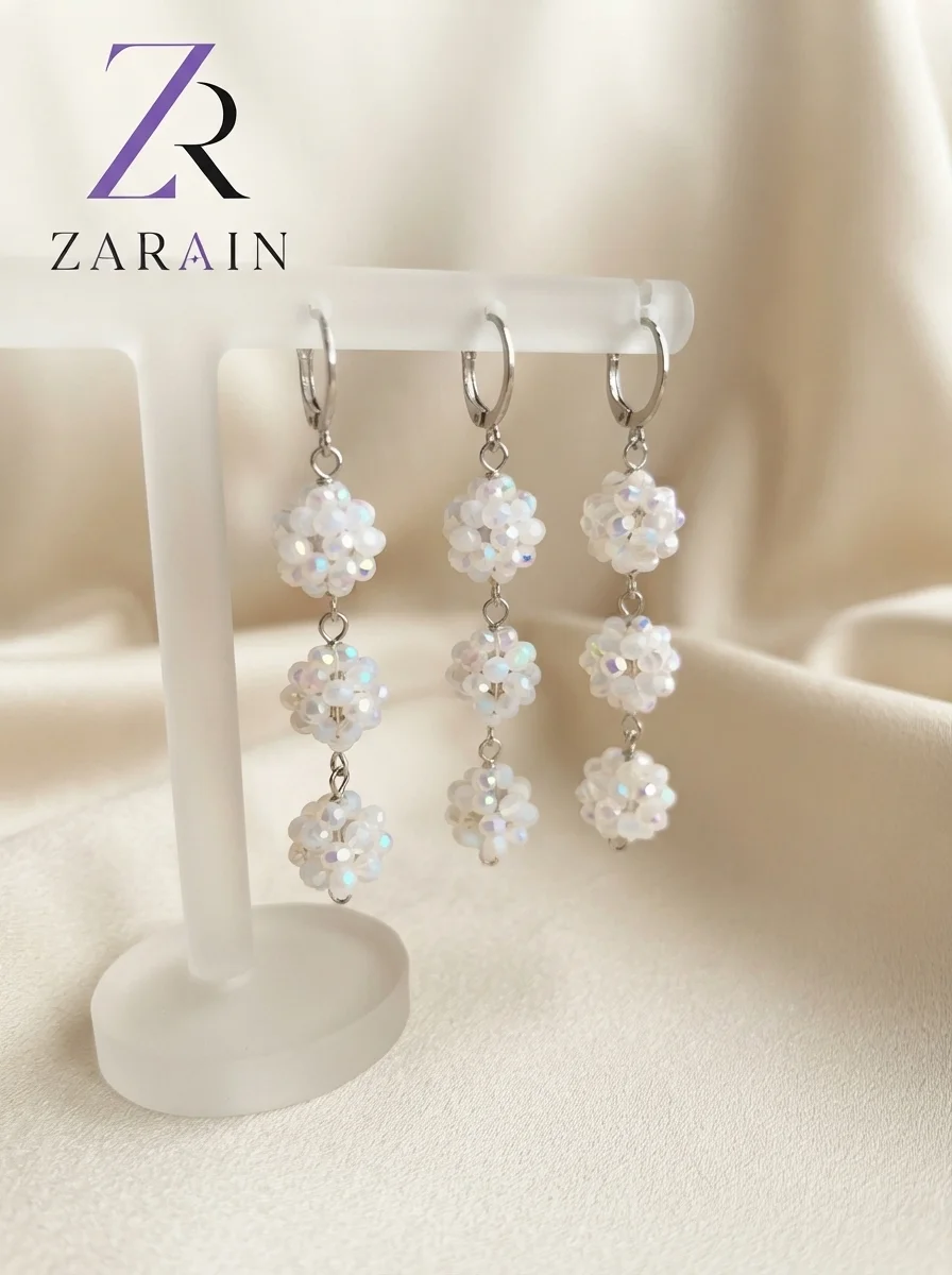 White beaded cluster drop earrings